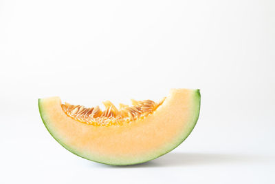 Close-up of fruit against white background