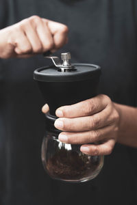 Manual coffee bean grinder.