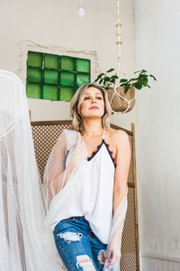 Portrait of beautiful woman at home