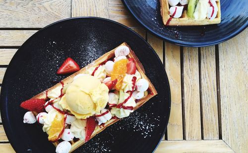 Directly above shot of food in plate on table