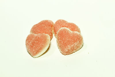 Close-up of heart shape over white background