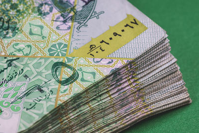 High angle view of paper currency on table