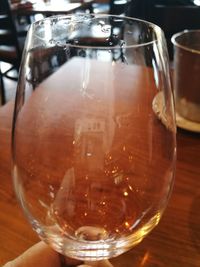 Close-up of wine in glass on table