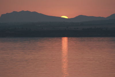 Scenic view of mountain against sky during sunset