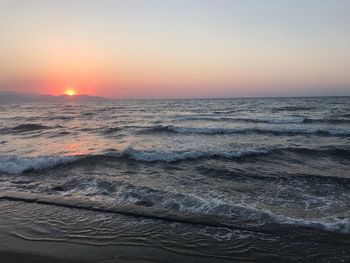 Scenic view of sea against sky during sunset