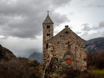 Low angle view of old building against sky