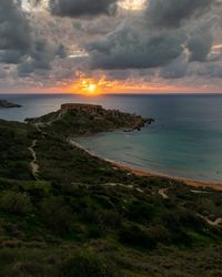 Scenic view of sea against sky during sunset