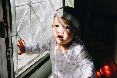 Portrait of cute girl at home