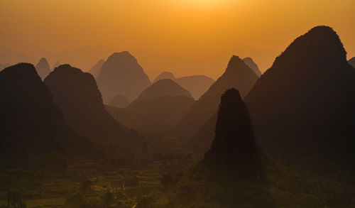 Silhouette of mountain during sunset