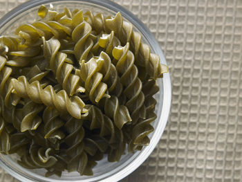 Close-up of fusilli pasta on table