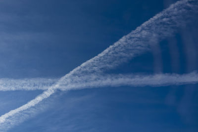 Blue sky and the plane on the route