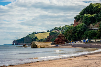 Scenic view of beach against sky