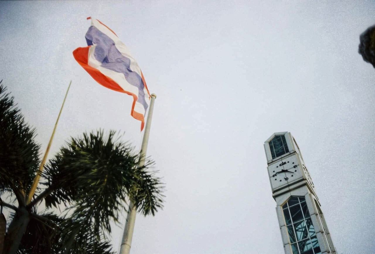 LOW ANGLE VIEW OF FLAG AGAINST SKY