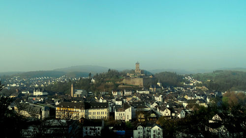 Cityscape against clear sky