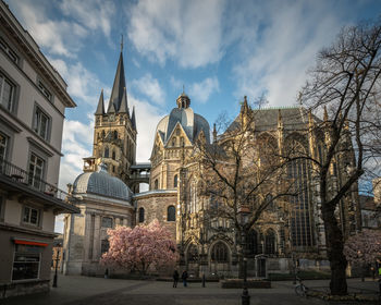 Panoramic view of trees and cathedral against sky