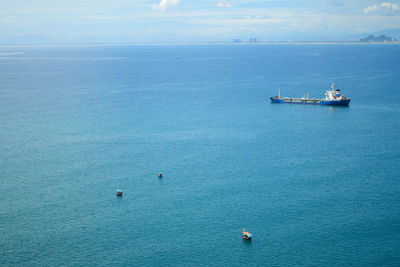 High angle view of ship sailing on sea against sky