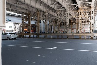 Road amidst buildings in city