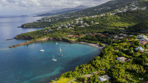 High angle view of bay against sky