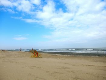 Scenic view of beach against sky