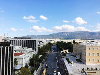 Road in city against sky