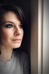 Close-up portrait of a smiling young woman