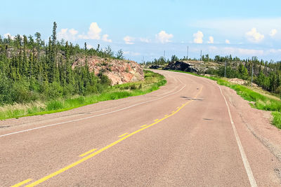 A wavy road commonly caused by permafrost.
