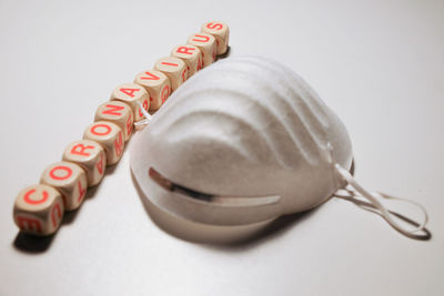 High angle view of coffee cup on white background