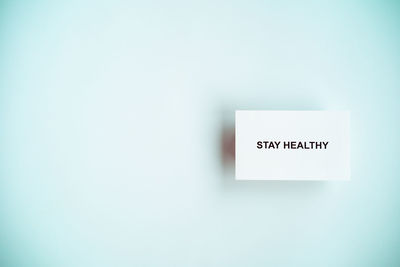 Close-up of text on white wall