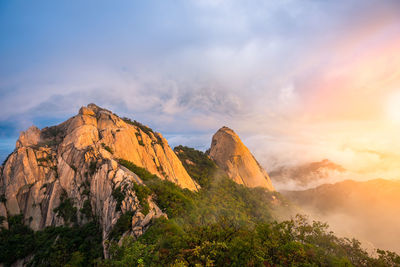 Scenic view of mountain against sky during sunset