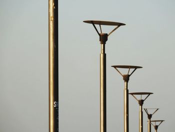 Low angle view of street light against sky