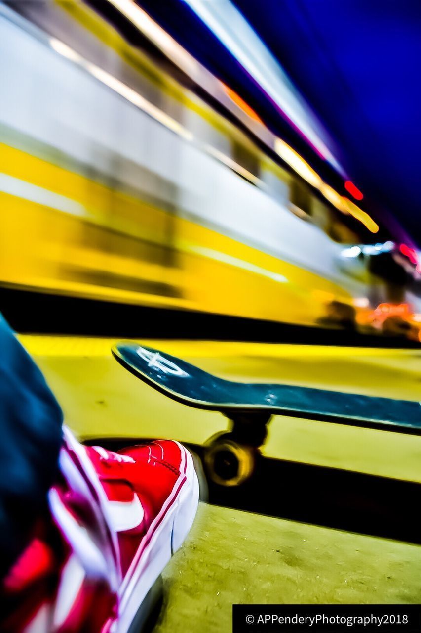 BLURRED MOTION OF YELLOW TRAIN