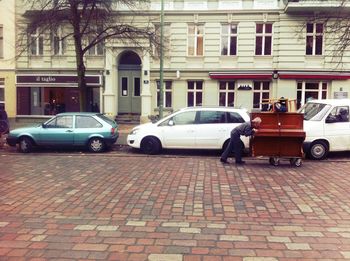 Cars parked in front of building