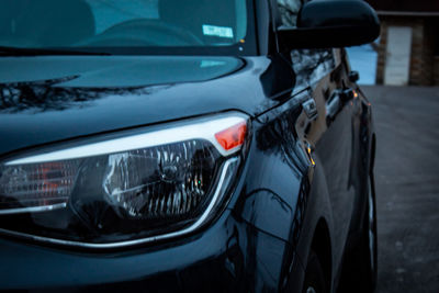 Reflection of car on street