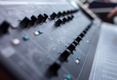 Close-up of sound console on stage