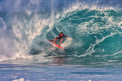 Man surfing in sea