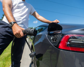 Midsection of man riding motorcycle