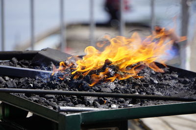 Close-up of bonfire on barbecue grill