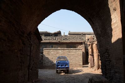 Buildings seen through arch