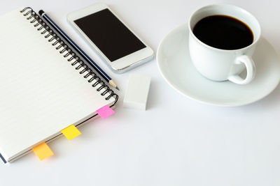 High angle view of coffee cup on table