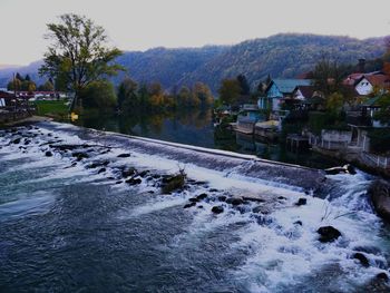 Scenic view of river against sky