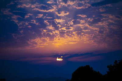 Scenic view of moon at sunset