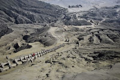 High angle view of people walking on land