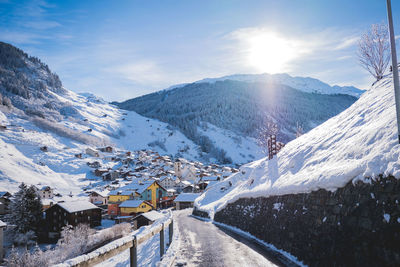 Scenic view of snowcapped mountains against sky during winter