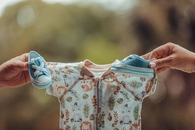 Midsection of woman wearing dress