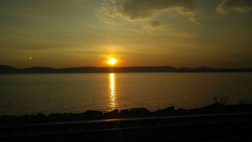 Scenic view of sunset over sea