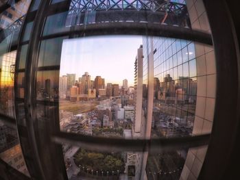 View of cityscape through window