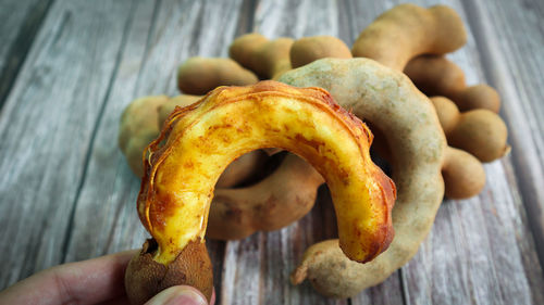 High angle view of person holding bread