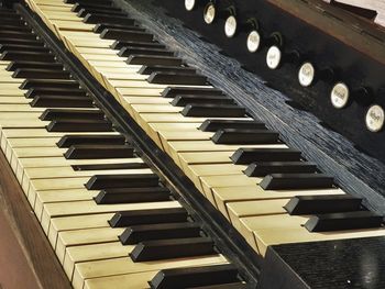 High angle view of piano keys