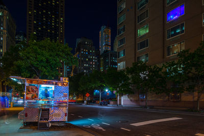 Illuminated buildings in city at night