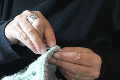 Close-up of woman holding hands